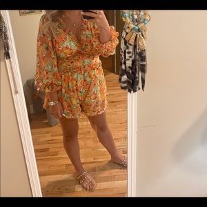 Bright beautiful open back romper